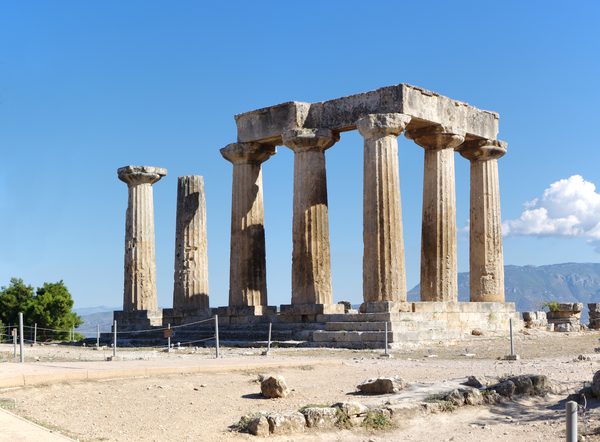 Remaining columns of the Temple of Apollo at Ancient Corinth with Acrocorinth hill behind