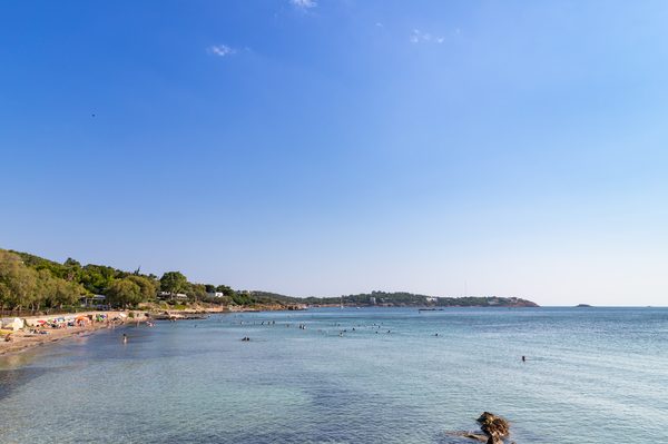 Aerial view of a turquoise beach at Vouliagmeni on the Athens Riviera coastline