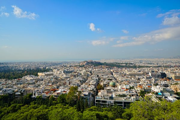 Panoramic view of Athens from Mount Lycabettus with the Acropolis in the centre and the sea of Piraeus in the distance