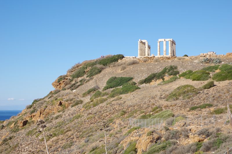 The Temple of Poseidon at Cape Sounion, Greece, with its marble columns on the clifftop above the sea