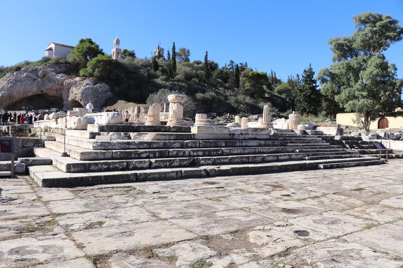 Stone remains of the Greater Propylaea gateway at the archaeological site of Eleusis