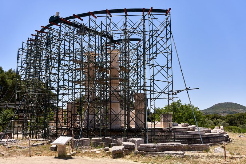 Ruins of the Tholos at the Sanctuary of Asclepius in Epidaurus, showing the circular stone foundations of the ancient healing centre in the Peloponnese