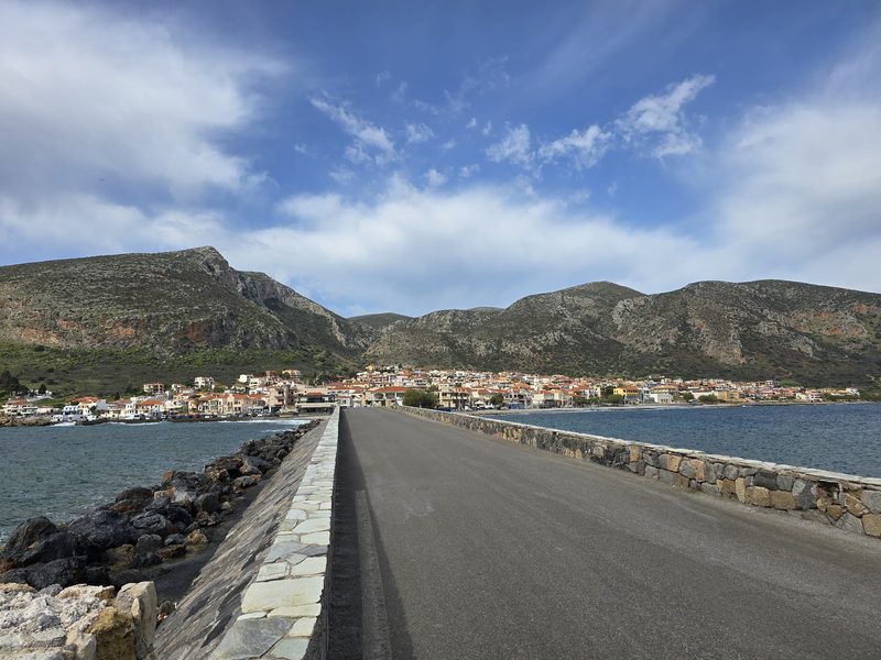 The stone causeway leading across the water towards the mainland town opposite the Monemvasia rock