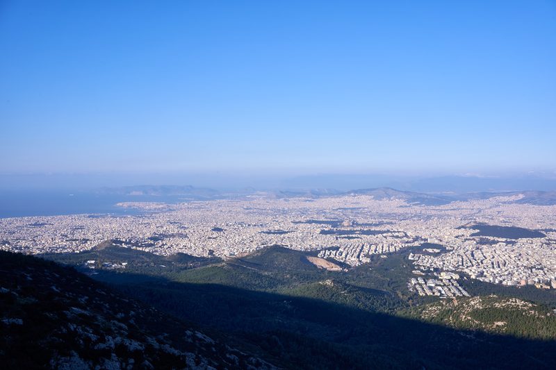 Panoramic view from Mount Hymettus looking west over Athens, with the Acropolis and Saronic Gulf in the distance
