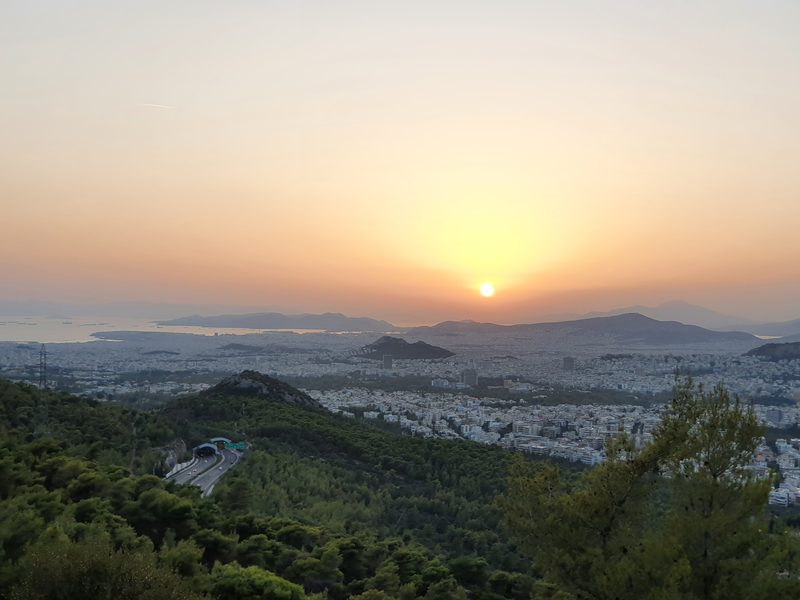 Sunset over Athens and the port of Piraeus, seen from a ridge on Mount Hymettus