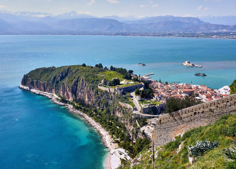 Panoramic view of Nafplio old town and Akronauplia castle from Palamidi fortress with the Argolic Gulf and Bourtzi castle visible