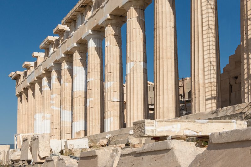 Doric columns of the Parthenon receding in perspective along the western colonnade of the Acropolis in Athens