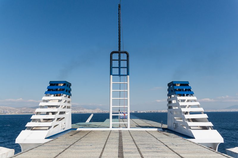 View from the open deck of a Greek ferry departing Piraeus harbour towards Aegina island
